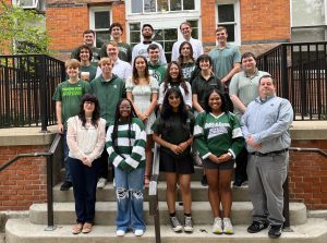 MSU Debate team students and staff on stairs of Linton Hall