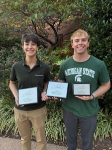 Joanna Gusis (left) and Stephen Lewis (right) holding semifinals plaque and speaker awards outside