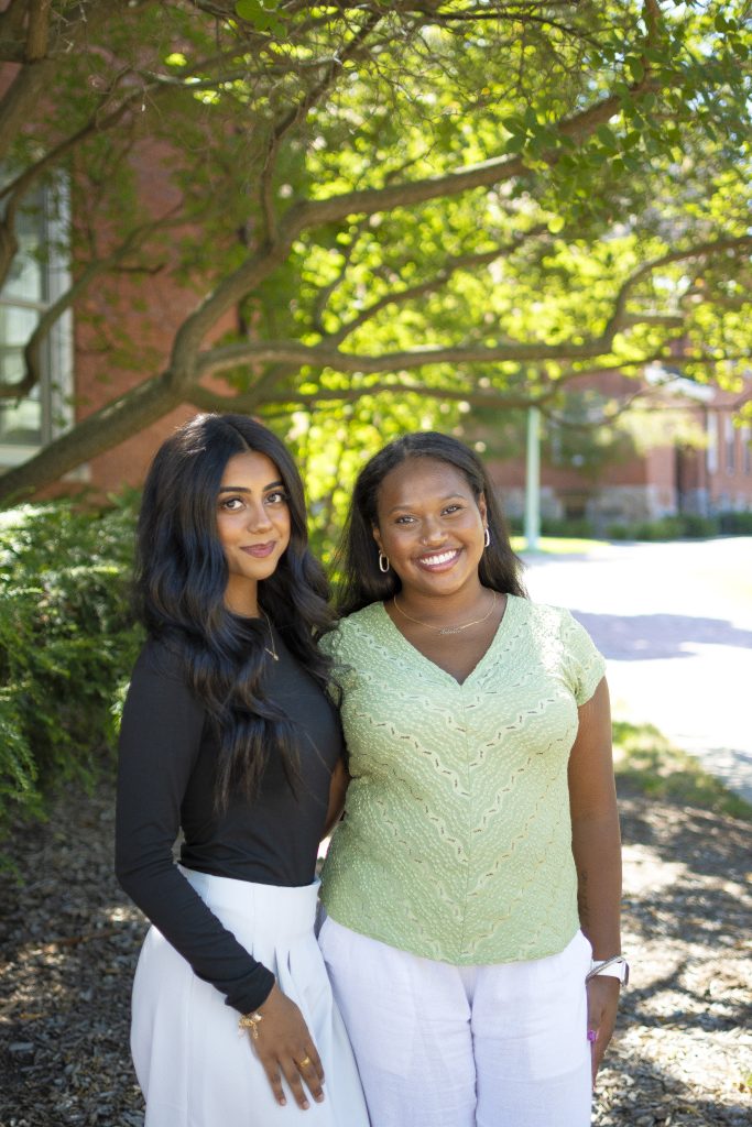 Hina Shehzad (left) and Arielle Gearring outside on a sunny day