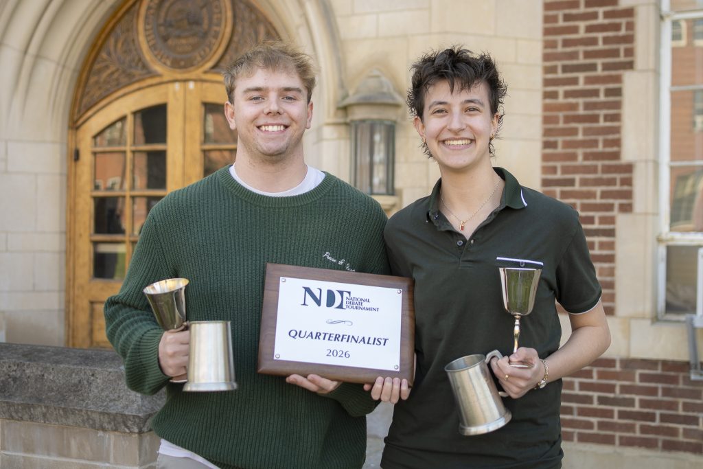 Stephen Lewis and Joanna Gusis pictured with awards from the National Debate Tournament