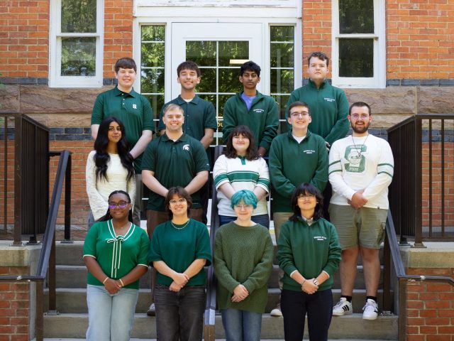 MSU Debate Team students on the steps of Linton Hall