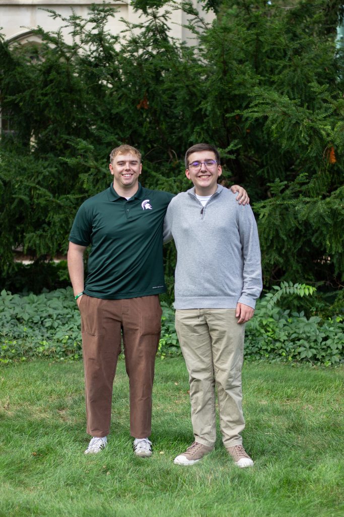 Stephen Lewis (left) and Henry Martin (right) pictured outside standing in front of green trees