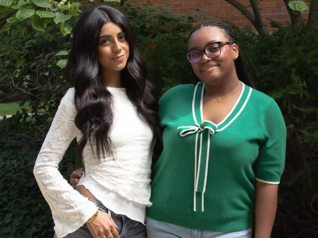 Hina Shehzad (right) and Zaria Jarman (left) pictured outside in front of Linton Hall